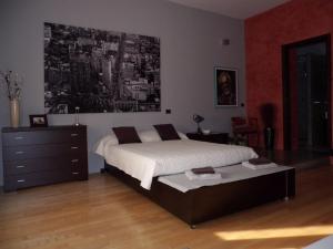 Postel nebo postele na pokoji v ubytování B&B Margè