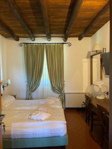Postel nebo postele na pokoji v ubytování Cascina Belvedì + 37 fotografií