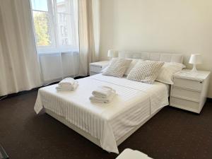 Postel nebo postele na pokoji v ubytování Hotel Mazowiecki WOW