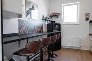 Kuchyň nebo kuchyňský kout v ubytování Eisenach Zentrum Saphir + 34 fotografií