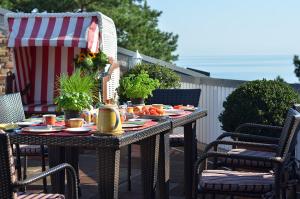 a table with food on it on a patio at Meerblick in Binz