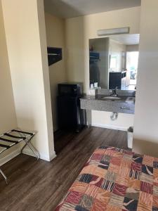 Kuchyň nebo kuchyňský kout v ubytování Relax Inn Marlin