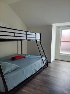 Postel nebo postele na pokoji v ubytování NYC HomeBnB