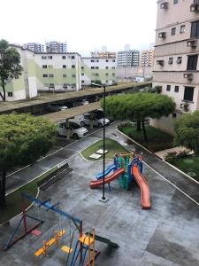 an aerial view of a playground in a parking lot at Apartamento Farolândia, Aracaju-SE in Atalaia Velha