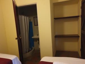 Ένα ή περισσότερα κρεβάτια σε δωμάτιο στο Hotel Liberia