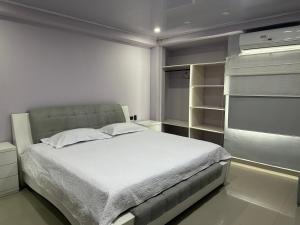 Postel nebo postele na pokoji v ubytování Jhonny Cay Collection Apartahotel