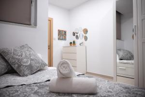Postel nebo postele na pokoji v ubytování Gibi & Lumo Apartment's by ELDI