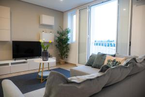 TV a/nebo společenská místnost v ubytování Gibi & Lumo Apartment's by ELDI