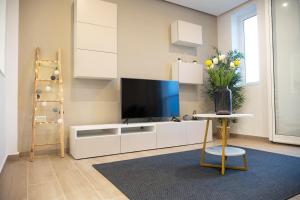 TV a/nebo společenská místnost v ubytování Gibi & Lumo Apartment's by ELDI