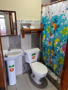 Vannituba majutusasutuses Hostal Cattleya
