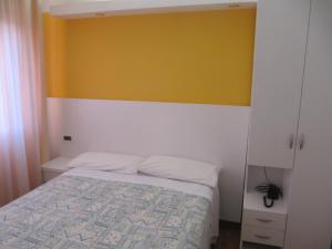 Postel nebo postele na pokoji v ubytování Hotel Sirena