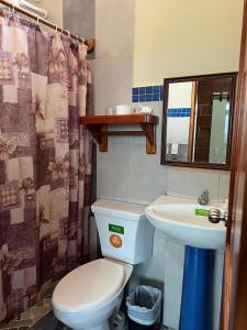 Vannituba majutusasutuses Hostal Cattleya