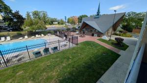an aerial view of a house with a swimming pool at Crystal Inn - Neptune in Neptune City