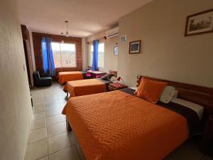 Istumisnurk majutusasutuses Hostal Cattleya