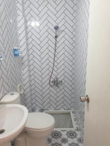Koupelna v ubytování Hotel Acar