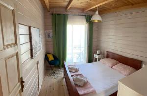 Postel nebo postele na pokoji v ubytování SeaStar Eco Villa