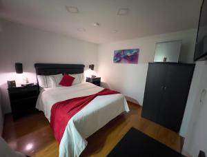 Postel nebo postele na pokoji v ubytování Hotel Veler