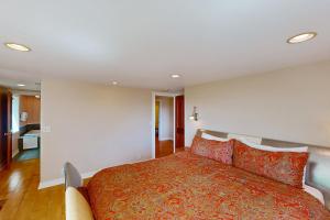 a bedroom with a large bed in a room at Blue Heron Bluff in Newport