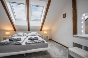 Posteľ alebo postele v izbe v ubytovaní Elements Apartments & Renata