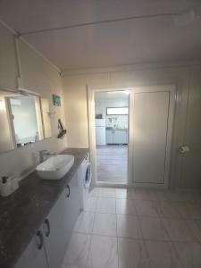 Koupelna v ubytování Rita Apartman & Studio + 37 fotografií