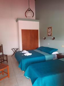 Postel nebo postele na pokoji v ubytování Apart Hotel Nonquen