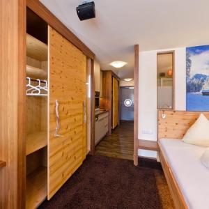 A bed or beds in a room at Appartementhaus Wetterloch
