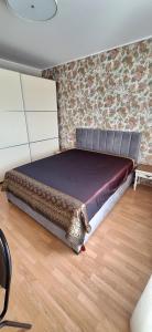 Katil atau katil-katil dalam bilik di Roberto dangaus apartamentai
