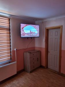 TV a/nebo společenská místnost v ubytování Gauchito Patagón
