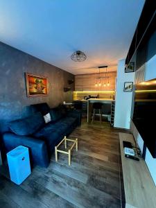 Predel za sedenje v nastanitvi LUX Apartment A&M Netflix