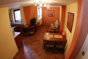 an overhead view of a living room with a table at Skałka Krakow Apartments in Krakow