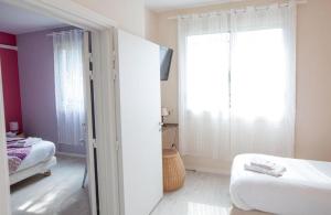 Postel nebo postele na pokoji v ubytování MOODz HOTEL VIENNE