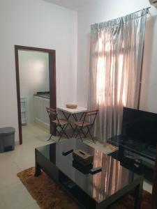 TV o dispositivi per l'intrattenimento presso Qantab Village Stay