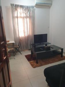 TV o dispositivi per l'intrattenimento presso Qantab Village Stay