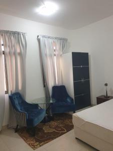 Area soggiorno di Qantab Village Stay