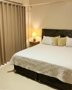 Ένα ή περισσότερα κρεβάτια σε δωμάτιο στο Darling Hotel Ciudad del Este