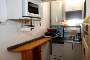 Una cocina o kitchenette en Loft Mendoza Capital Musica y Fotografia