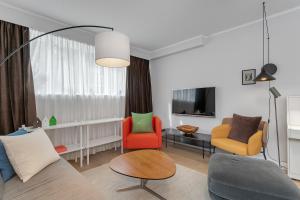 TV a/nebo společenská místnost v ubytování Modern Perfectly Located Apartment