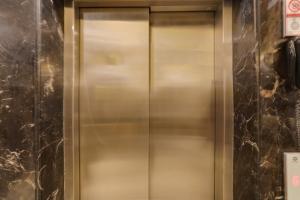 a elevator in a building at Super Townhouse MA-32 in Gurgaon +24 photos