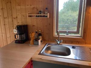 Cosy cottage close to natural pearls廚房或簡易廚房
