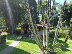 Um jardim em Pousada Bela Vista