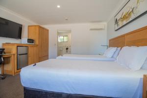 Best Western Club Quirindi Motel客房内的一张或多张床位