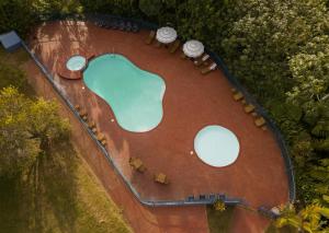Bazén v ubytování El Oasis Hotel nebo v jeho okolí