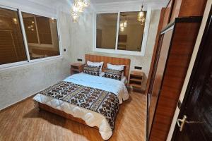 A bed or beds in a room at Bunga SMART