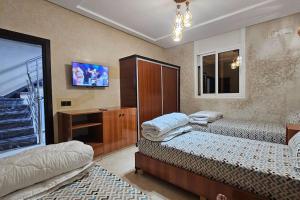 A bed or beds in a room at Bunga SMART