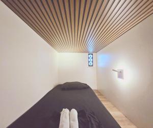 Seasun Hostel客房内的一张或多张床位