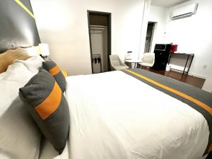 Postelja oz. postelje v sobi nastanitve Duncan Motel