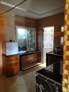 a kitchen with a sink and a counter top at Agadir in Agadir