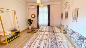 a bedroom with a large bed and a mirror at D Home Sapa 3 in Sa Pa