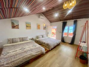 Ένα ή περισσότερα κρεβάτια σε δωμάτιο στο D Home Sapa 3