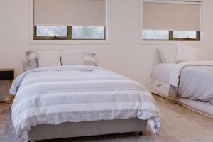 Postel nebo postele na pokoji v ubytování The Little Lobster